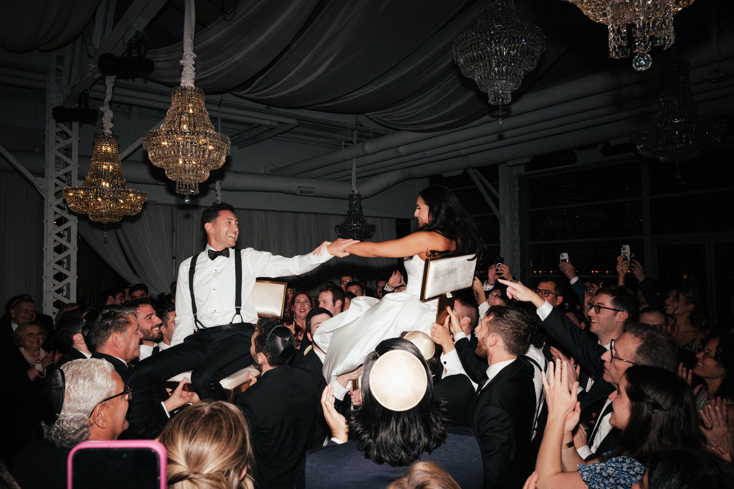 Newlyweds doing hora