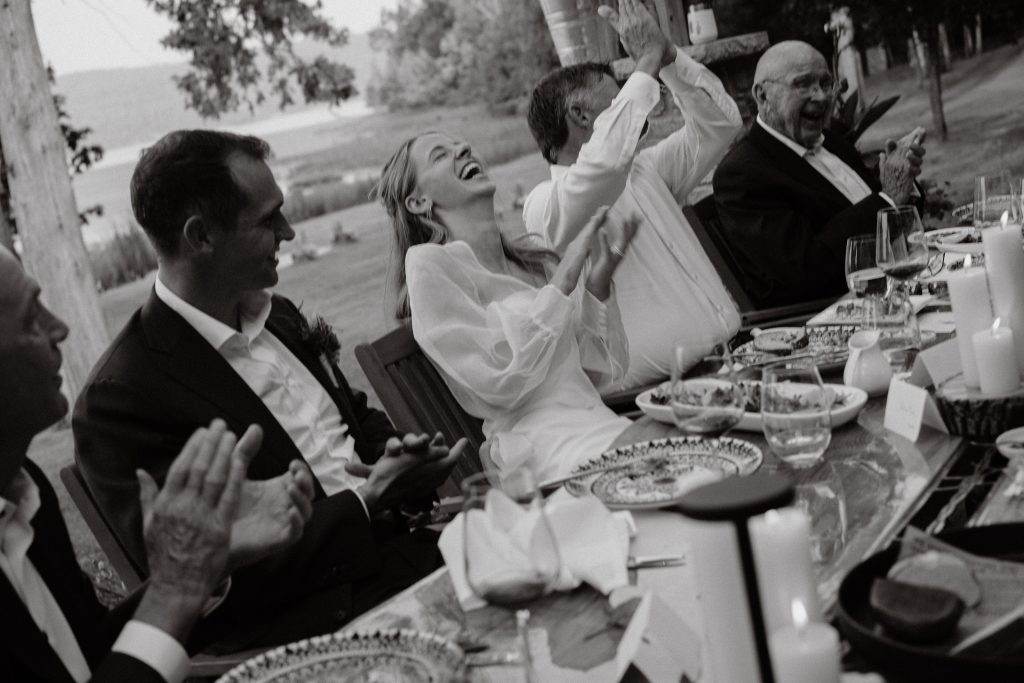 wedding family celebrating at dinner